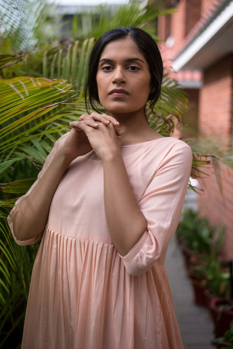 A Pinched Coral Dress